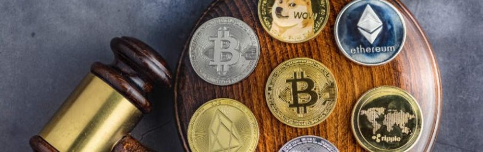 Legal gavel alongside some of the most popular crypto tokens